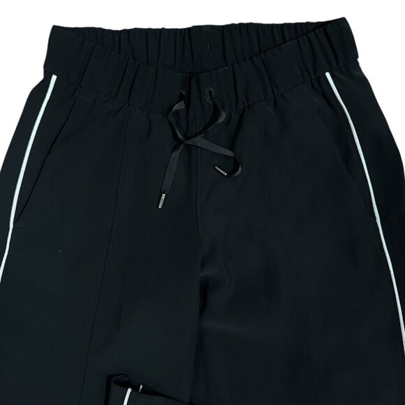 Lululemon Size 4 Athletica Womens the Right track silk feel pants black White - Picture 7 of 11